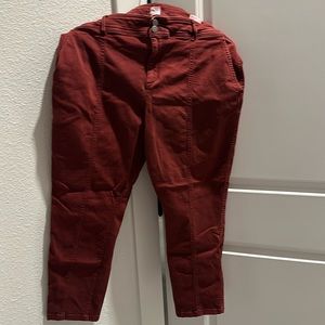 High rise skinny jeans with center leg seam and double buttons